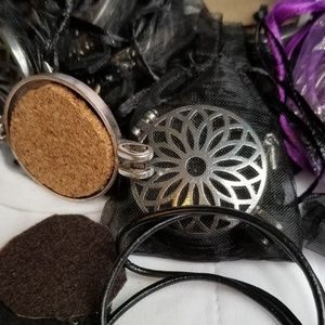 2 Silver locket/oil diffuser 1.5 in. 22 in leather